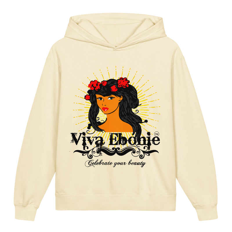 A cream-colored pullover hoodie featuring a graphic print of a woman with long black hair, red flowers in her hair, and a yellow sunburst background. Below the illustration, the text reads 'Viva Ebonyie' and 'Celebrate your beauty'.
