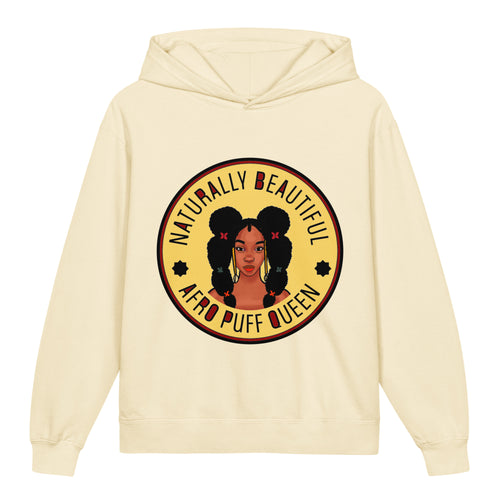 A cream-colored pullover hoodie featuring a circular graphic print on the chest. The graphic depicts a stylized portrait of a woman with large black bubble buns and the text 'NATURALLY BEAUTIFUL AERO PUFF QUEEN' in brown and black lettering.